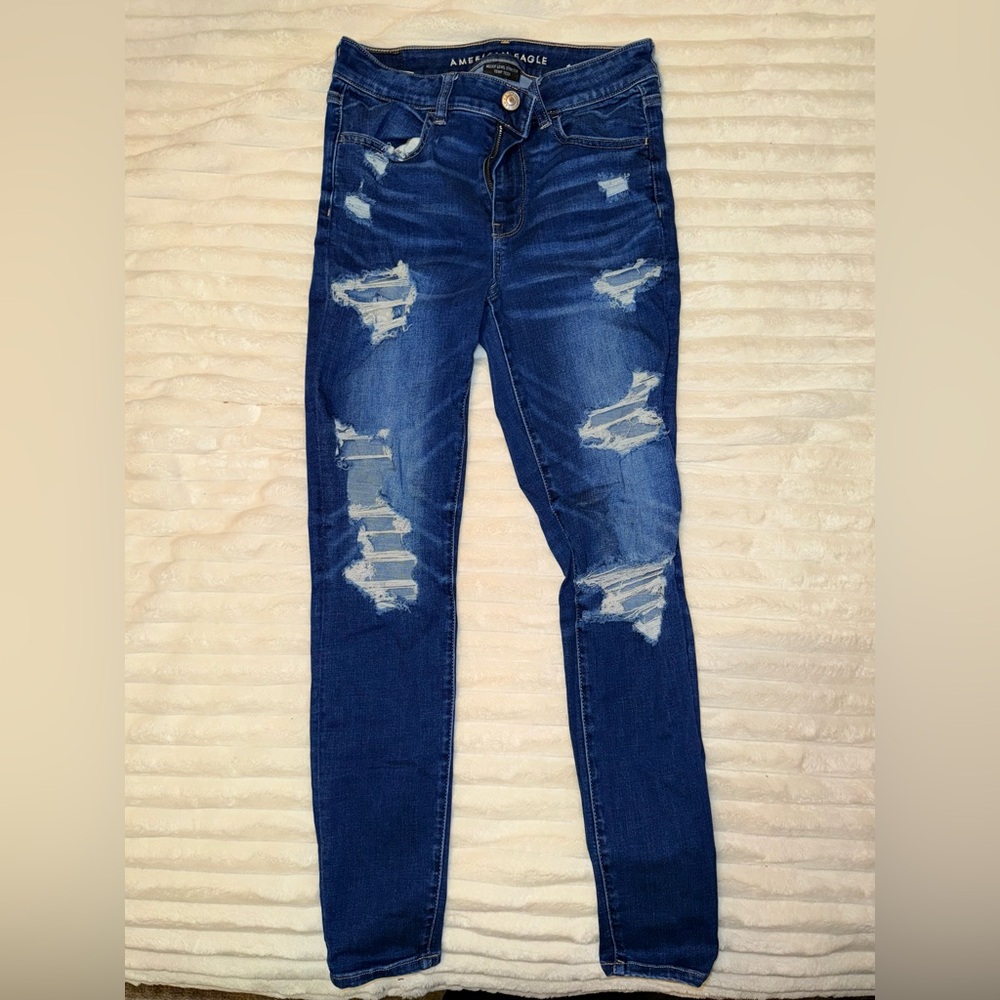 Super distressed American eagle skinny jeans - super stretchy and cute